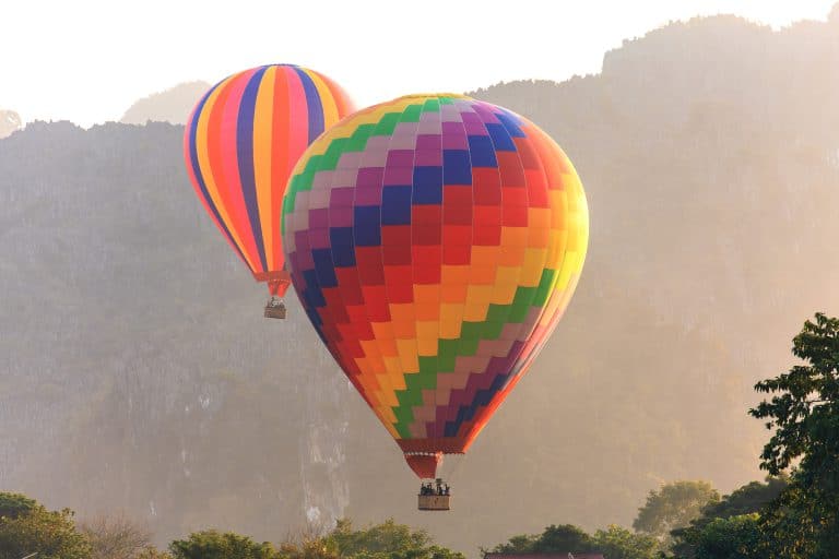 Hot air balloon over mountain, Vang Vieng, Laos